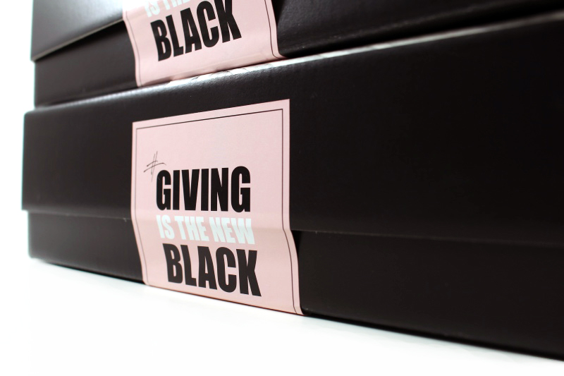 oben 1 - Giving is the new black & Gewinnspiel